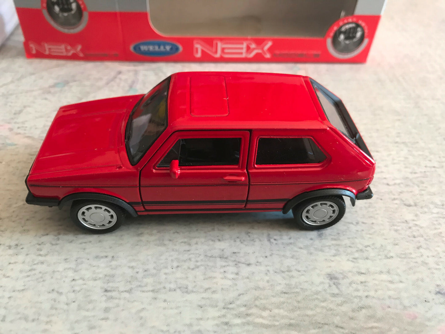 Voiture miniature Volkswagen Golf I 1 GTI Welly 1/34 - 1/36 - 1/39