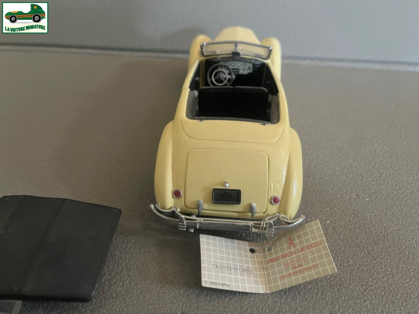 Voiture miniature 1937 Cord 812 Phaeton Coupé Franklin Mint 1/24 Défauts