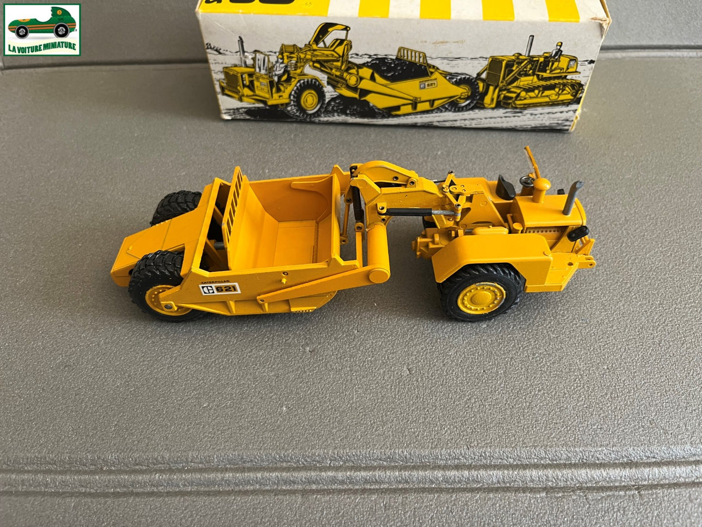 Miniature Engin Véhicule de chantier CAT 621 NZG au 1/50