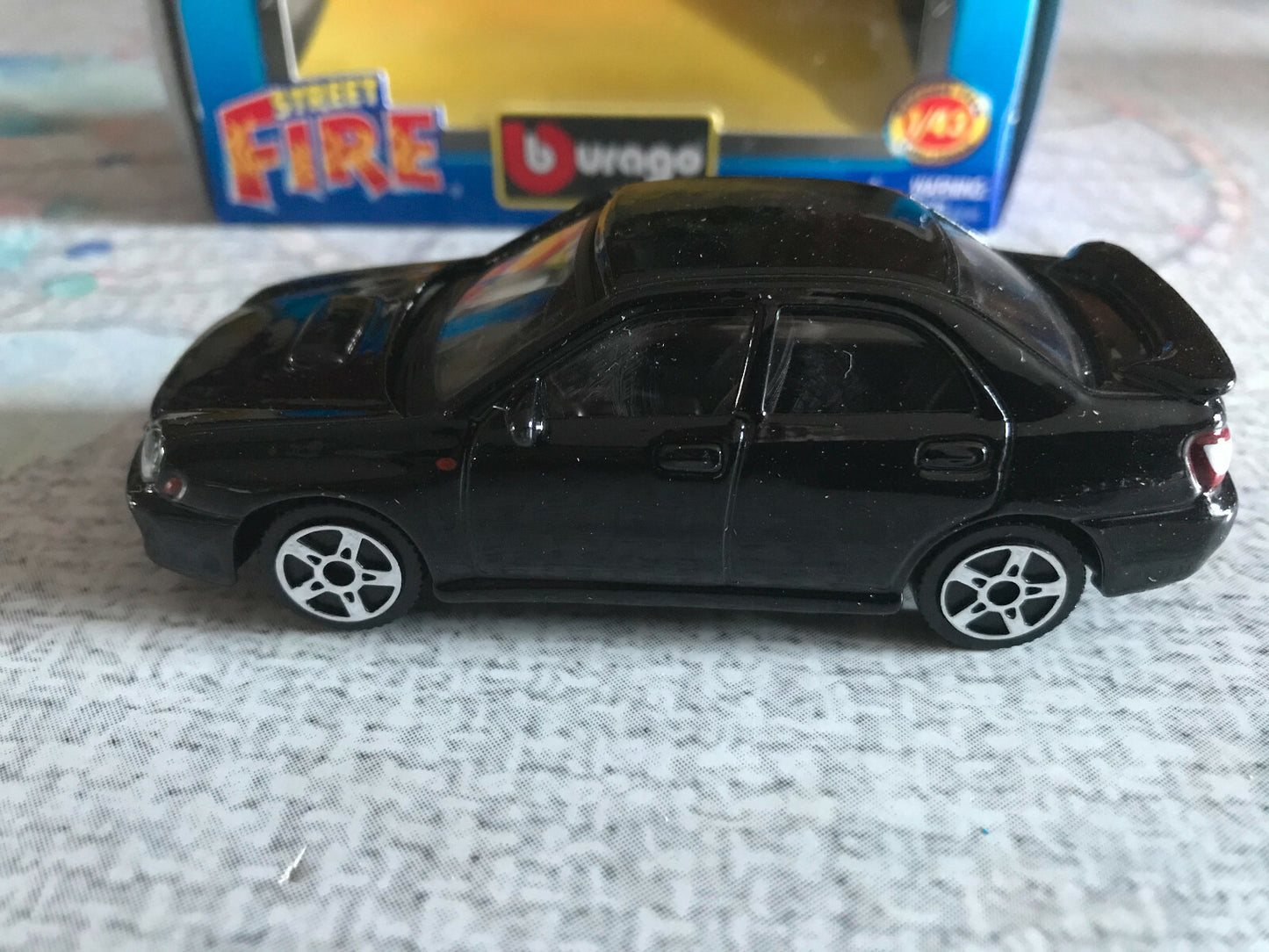 Voiture miniature Burago Street Fire Subaru Impreza WRX STI au 1/43