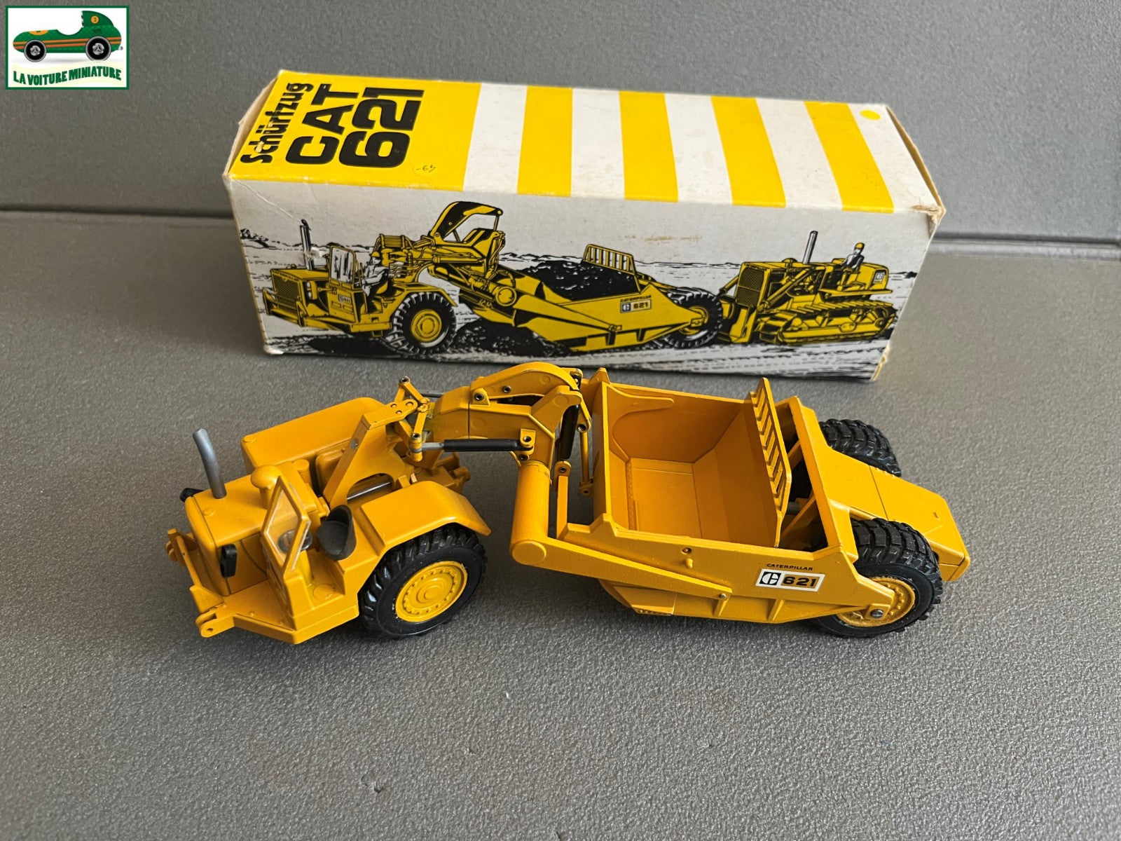 Miniature Engin Véhicule de chantier CAT 621 NZG au 1/50
