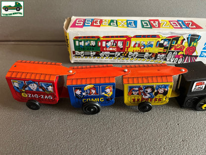 Ancien Jouet de Bazar Plastique Mécanisme Clé Train Zig Zag Express Comic Corée