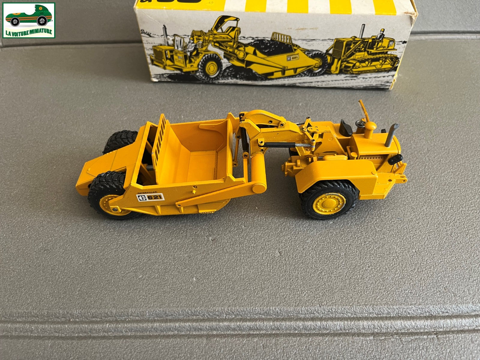 Miniature Engin Véhicule de chantier CAT 621 NZG au 1/50