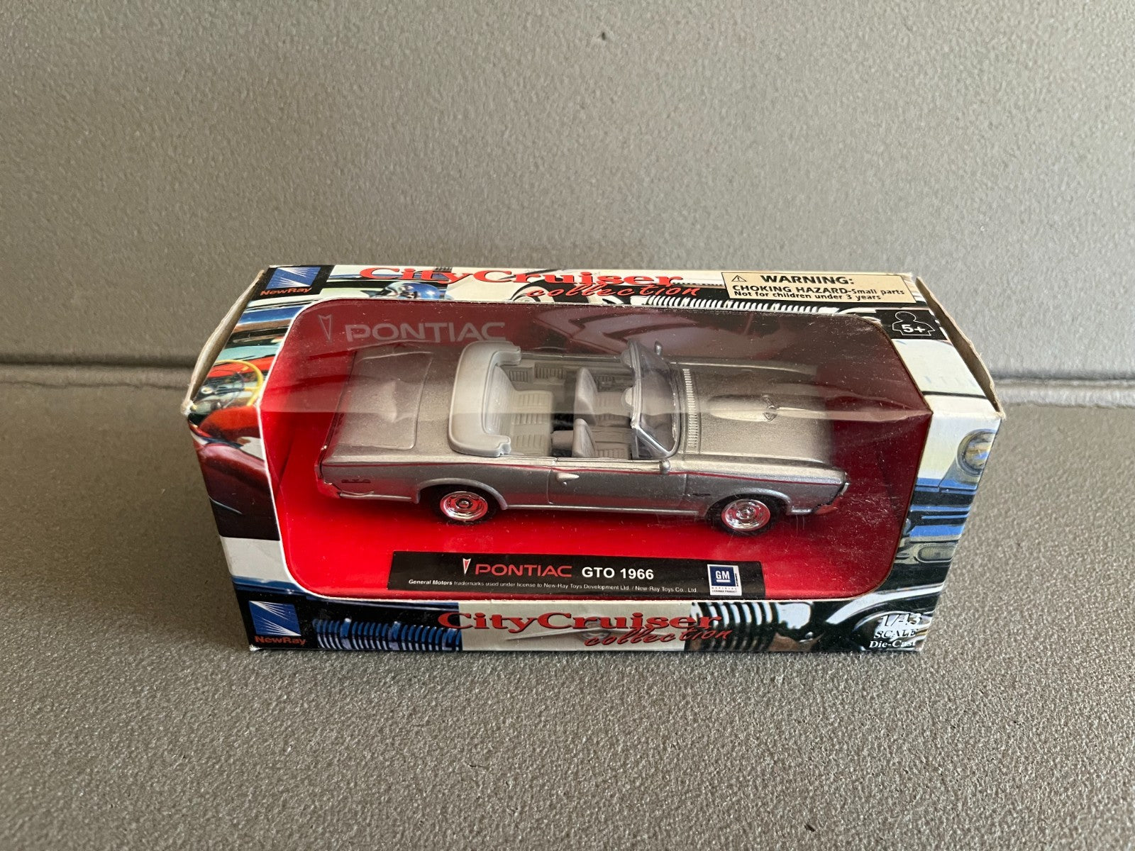 Voiture Miniature Pontiac GTO 1966 New Ray City Cruiser au 1/43