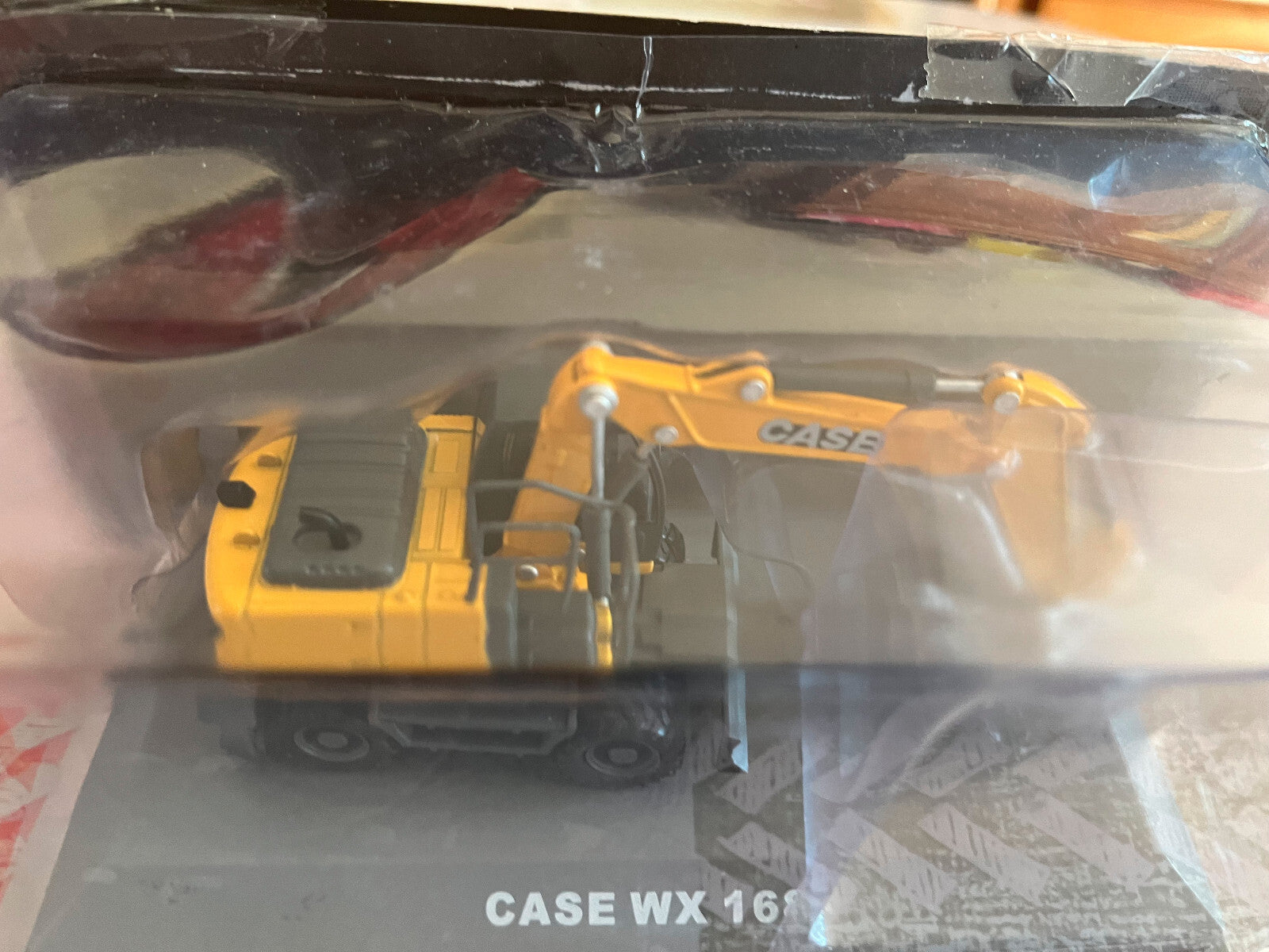 Miniature Véhicule de chantier Pelle Case WX 168 Hachette 1/72