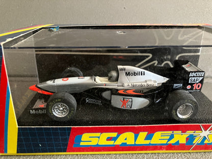 Ancienne Voiture Miniature Circuit Formule 1  McLaren West C2124 Scalextric 1/32
