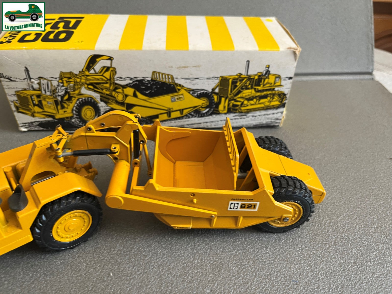 Miniature Engin Véhicule de chantier CAT 621 NZG au 1/50