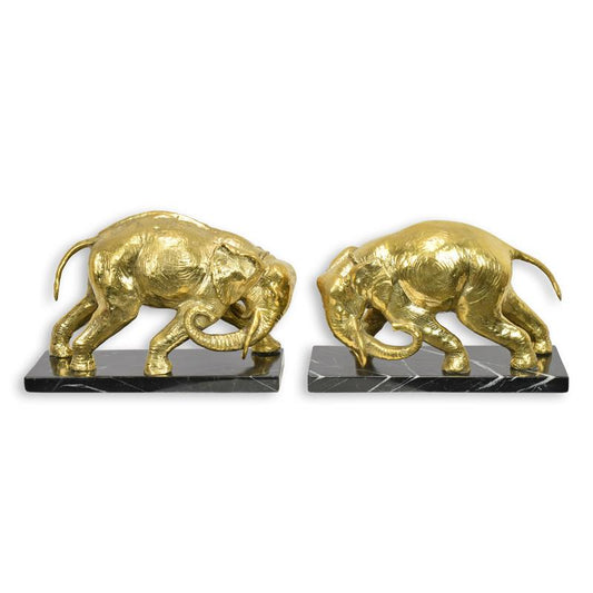 UNE PAIRE DE SERRE-LIVRES ÉLÉPHANTS EN BRONZE